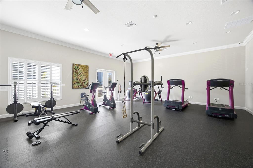 8210 Aquila Street, Unit 227 Port Richey, FL 34668 - Photo 57 of 68 a view of a room with gym equipment