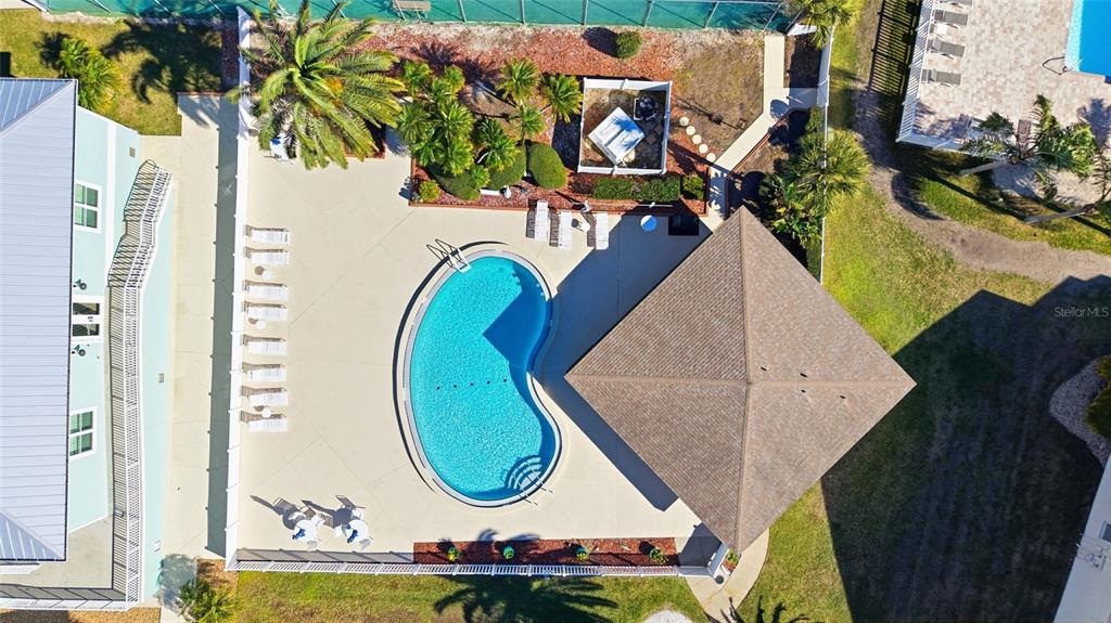 8210 Aquila Street, Unit 227 Port Richey, FL 34668 - Photo 58 of 68 an aerial view of a house with swimming pool