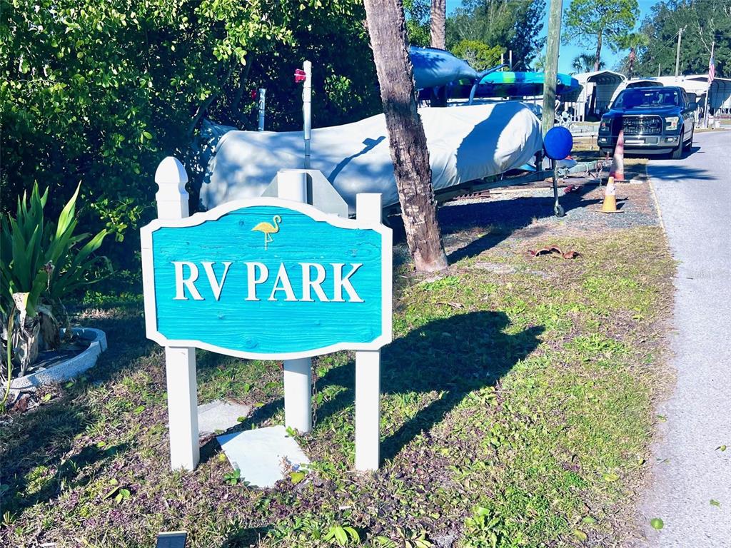 8210 Aquila Street, Unit 227 Port Richey, FL 34668 - Photo 60 of 68 a view of an chairs and table in the patio