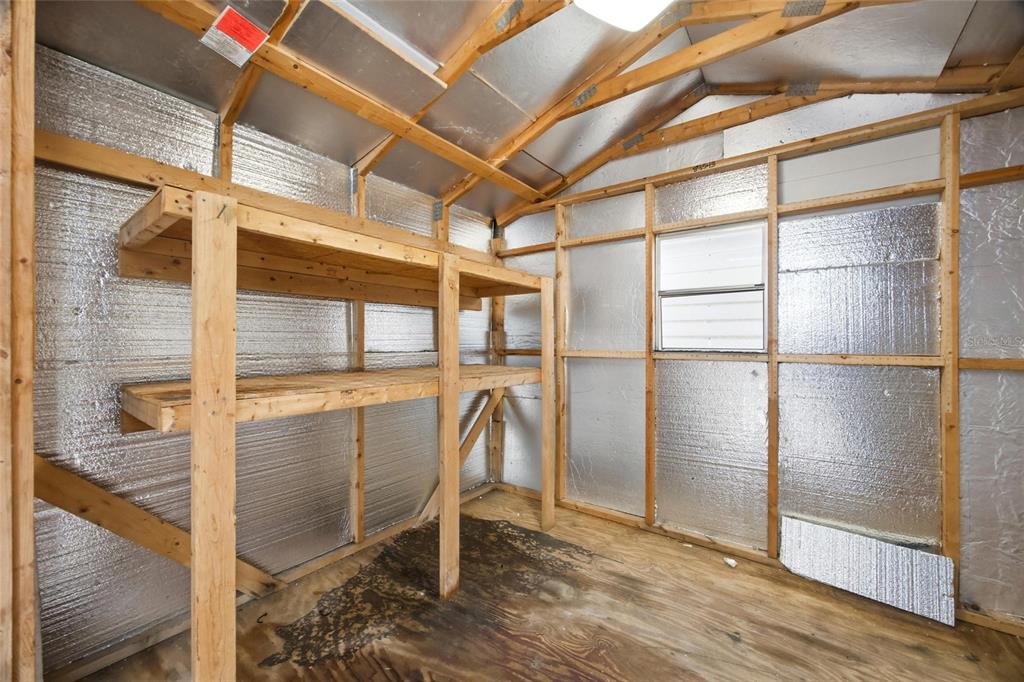 8210 Aquila Street, Unit 227 Port Richey, FL 34668 - Photo 64 of 68 a room with sliding door