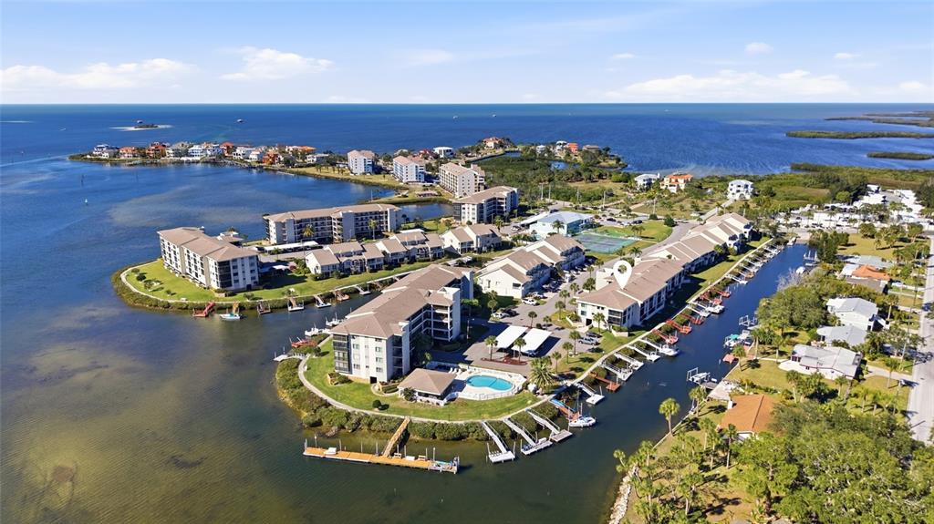 8210 Aquila Street, Unit 227 Port Richey, FL 34668 - Photo 66 of 68 a picture of a table and chairs in a patio