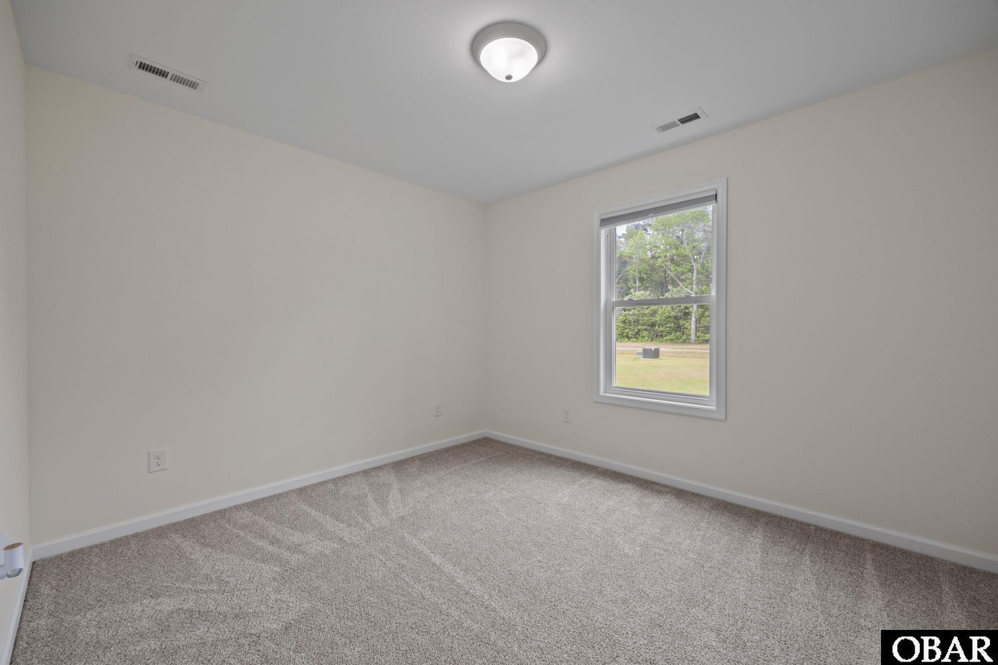 194 Barnard Road, Unit 1 Grandy, NC 27965 - Photo 31 of 58 2nd bedroom