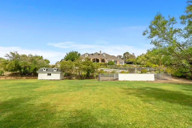 a view of a swimming pool with an ocean view