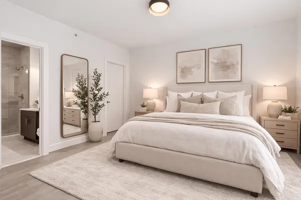 a bedroom with a balcony a bed and a painting on the wall