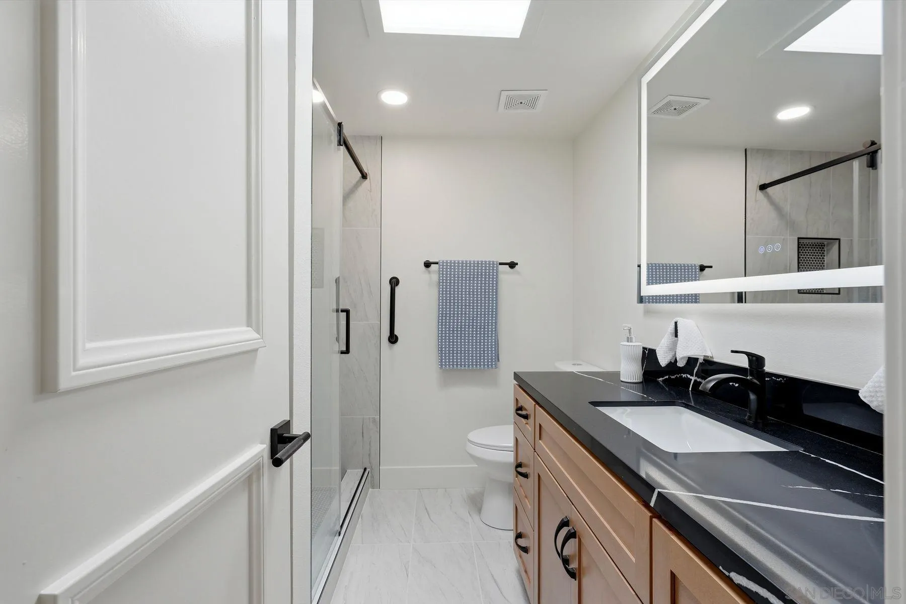 3606 Vista Rey, Unit 46 Oceanside, CA 92057 - Photo 21 of 36 a kitchen with a sink stove and refrigerator