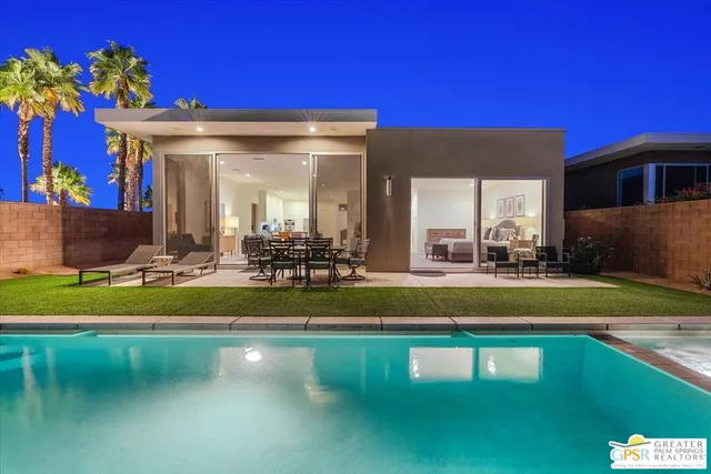 a view of a house with a swimming pool