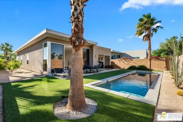 a view of a house with swimming pool