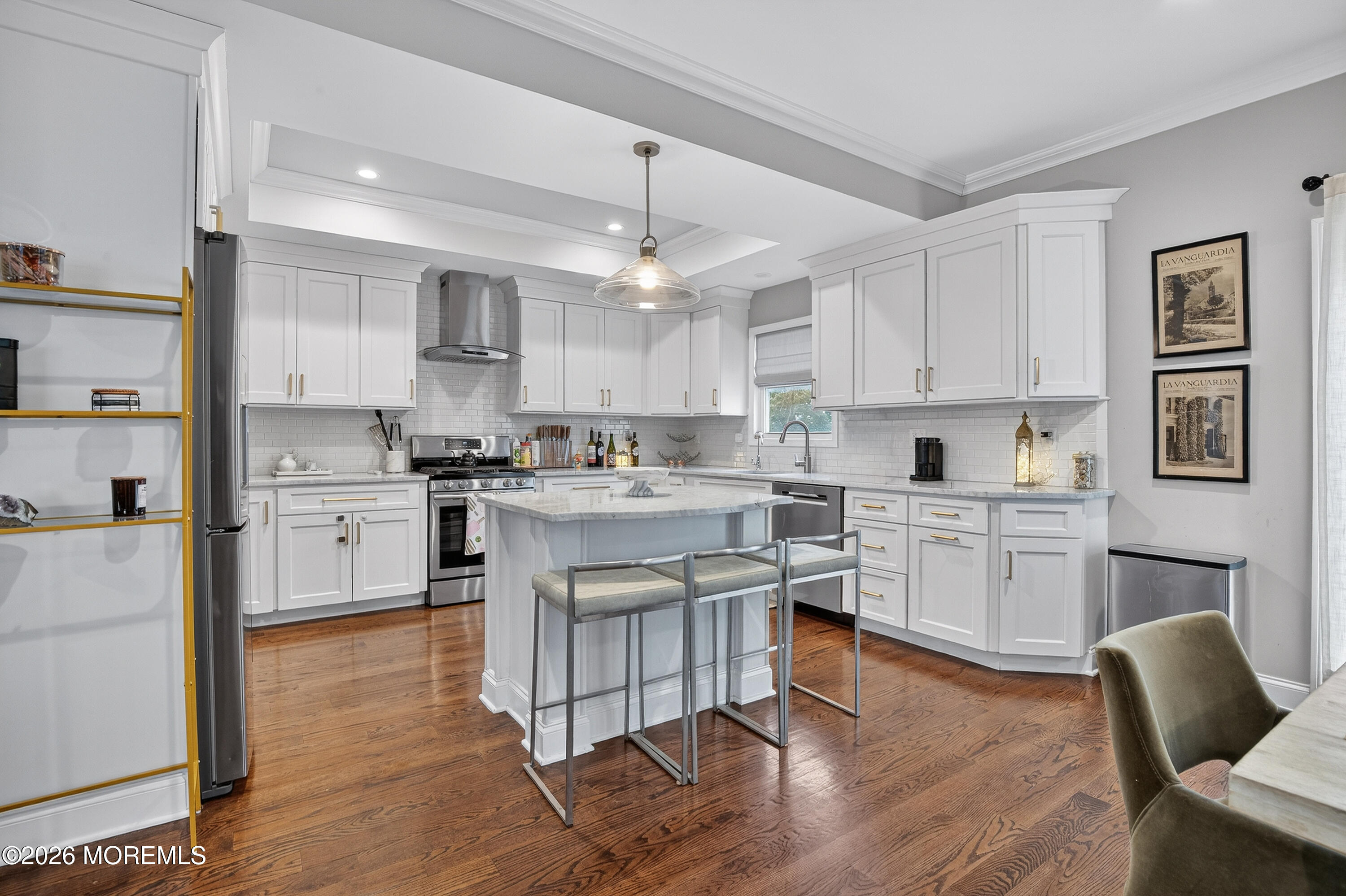 27 5th Street Highlands, NJ 07732 - Photo 4 of 62 a kitchen with white cabinets and appliances