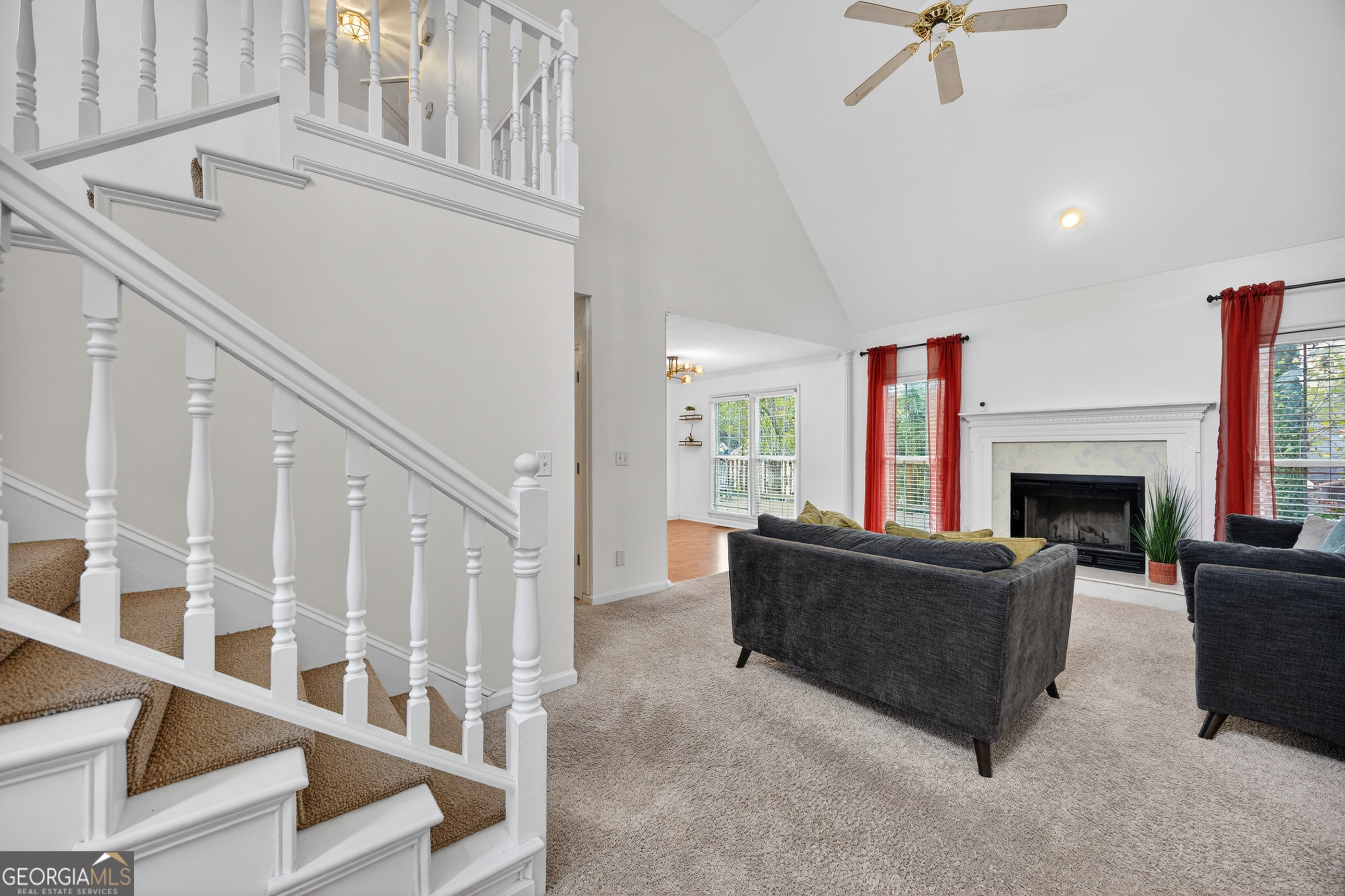199 Springfield Boulevard Macon, GA 31210 - Photo 11 of 44 a living room with furniture and a fireplace