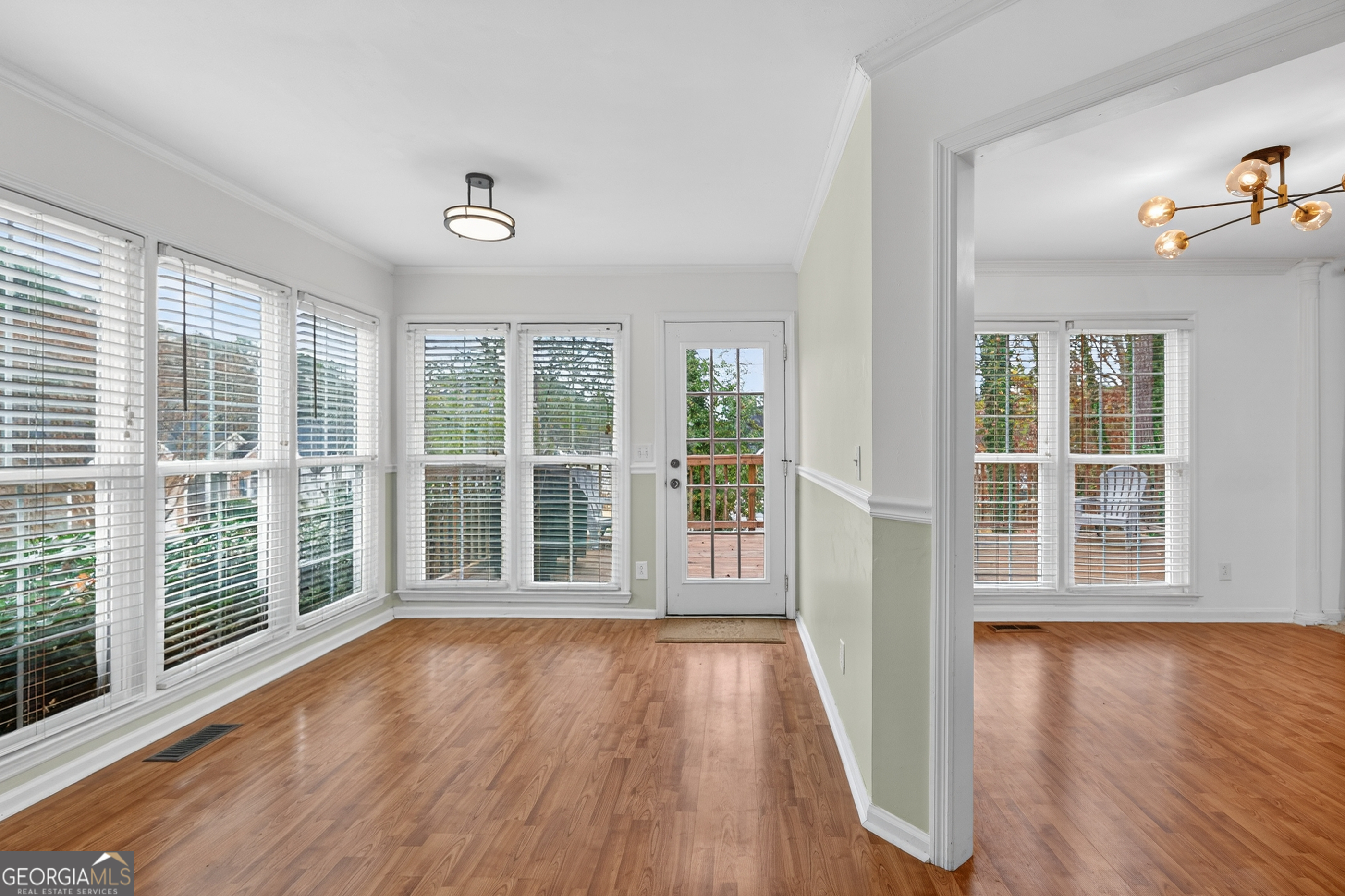 199 Springfield Boulevard Macon, GA 31210 - Photo 19 of 44 wooden floor in an empty room with a window