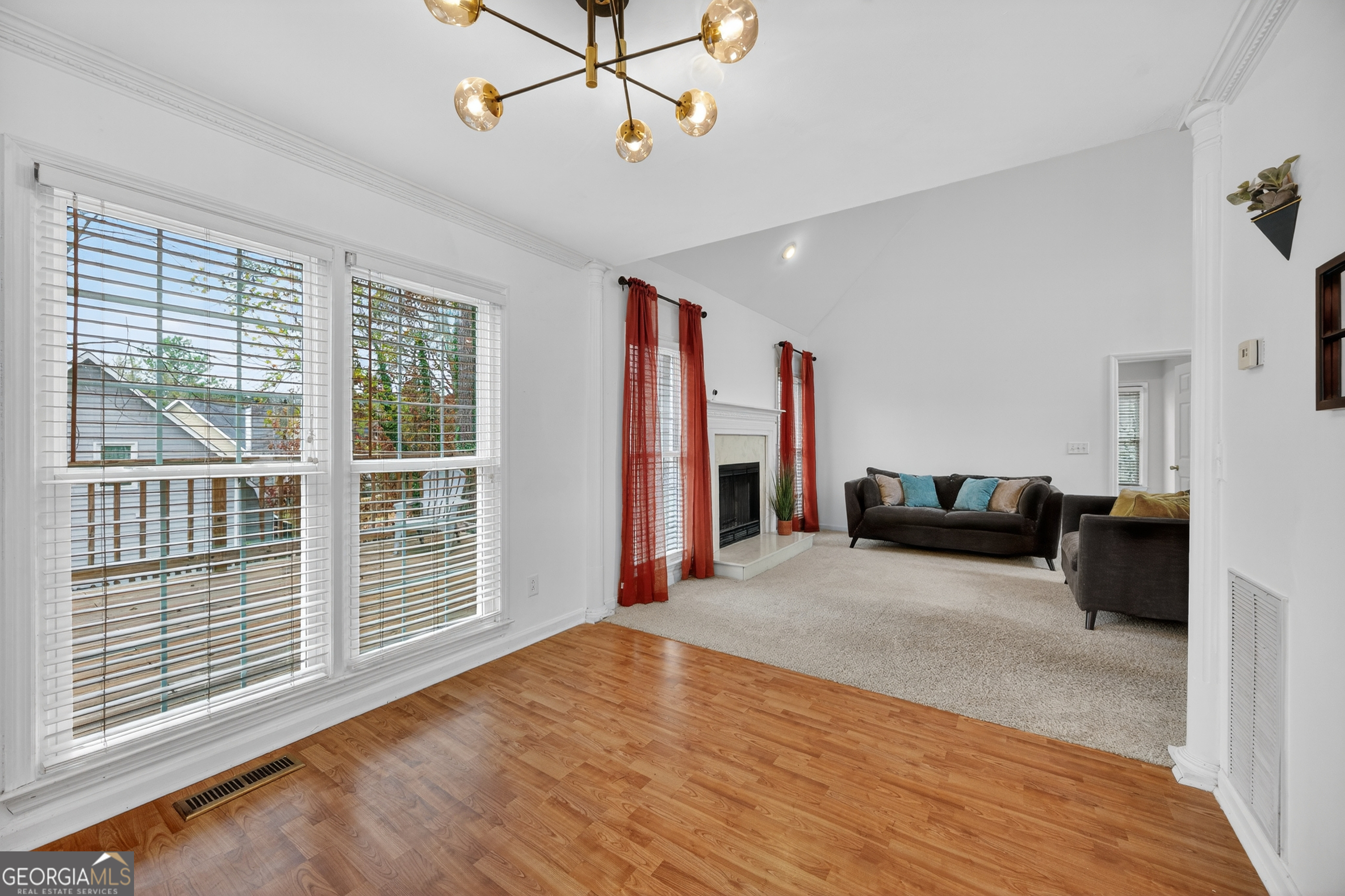 199 Springfield Boulevard Macon, GA 31210 - Photo 23 of 44 a view of livingroom with furniture wooden floor and windows