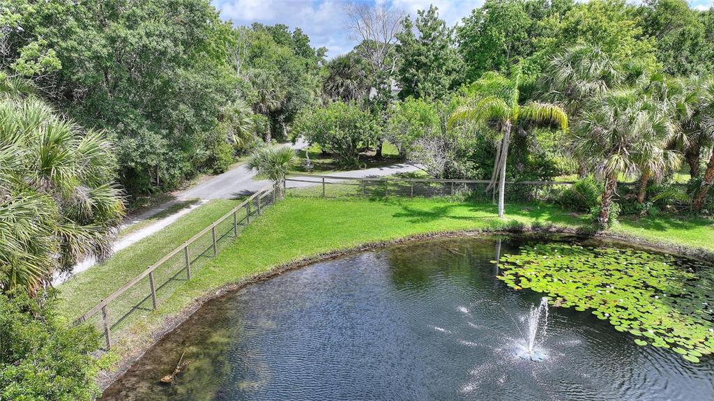 3641 Turtle Mound Road Melbourne, FL 32934 - Photo 55 of 77 a view of a park with large trees