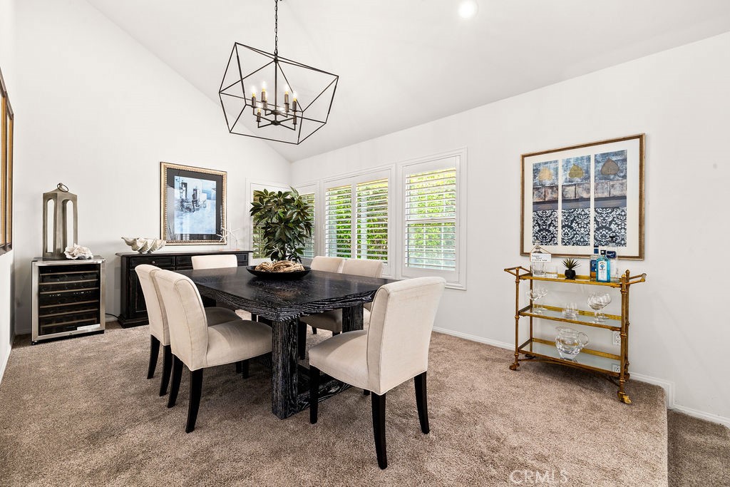 1 Centaurus, Unit 12 Irvine, CA 92603 - Photo 11 of 37 a view of a dining room with furniture window and outside view