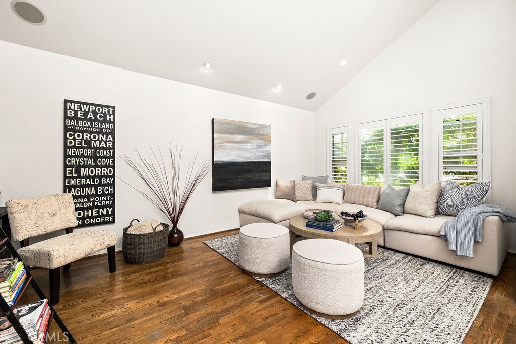 1 Centaurus, Unit 12 Irvine, CA 92603 - Photo 17 of 37 a living room with furniture and a large window
