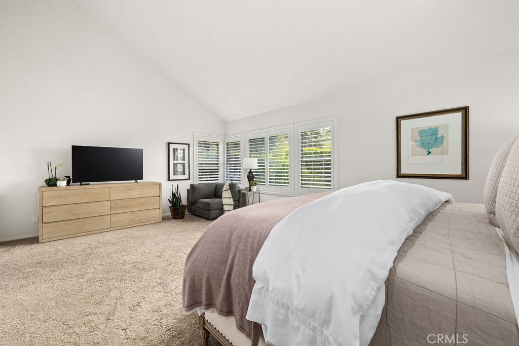 1 Centaurus, Unit 12 Irvine, CA 92603 - Photo 23 of 37 a living room with furniture and a flat screen tv