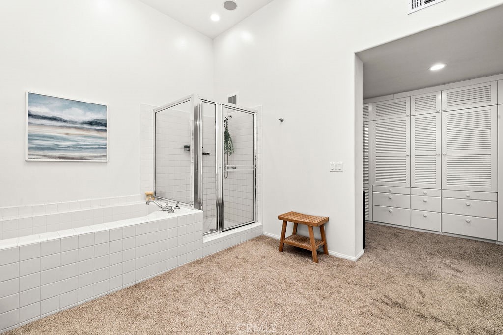 1 Centaurus, Unit 12 Irvine, CA 92603 - Photo 26 of 37 a spacious bedroom with a bed and a shower