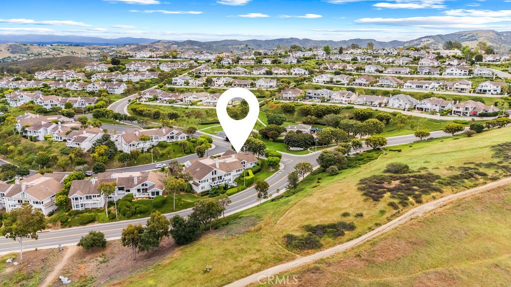 1 Centaurus, Unit 12 Irvine, CA 92603 - Photo 35 of 37 an aerial view of residential houses with outdoor space