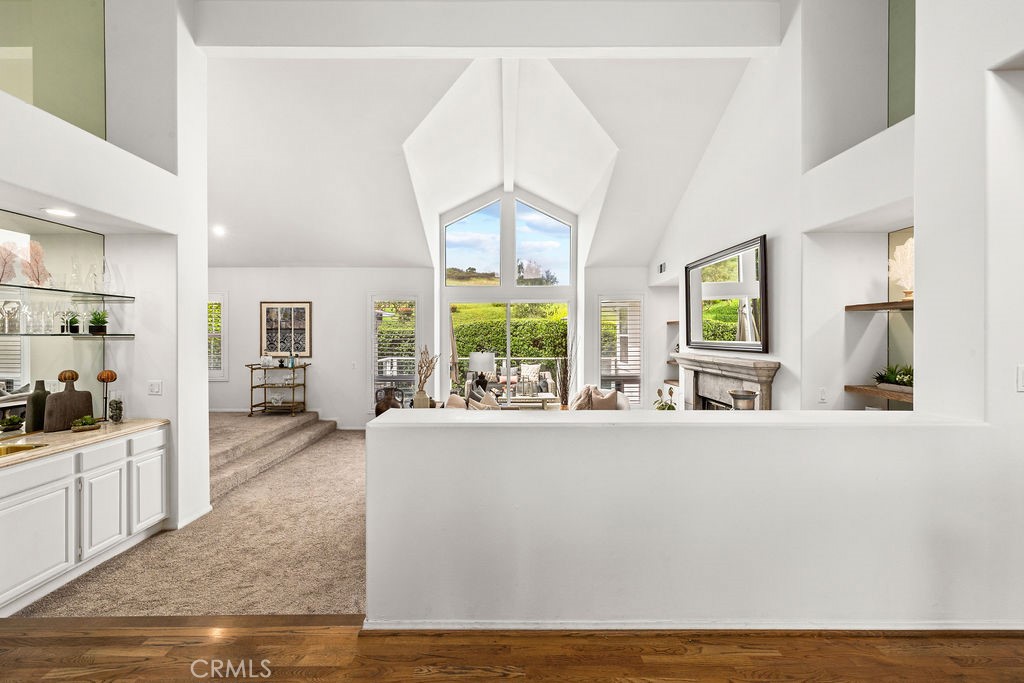 1 Centaurus, Unit 12 Irvine, CA 92603 - Photo 5 of 37 a living room with furniture and large windows