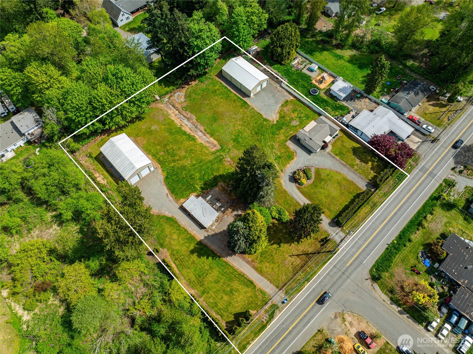17830 116th Avenue Southeast Renton, WA 98058 - Photo 2 of 10 an aerial view of a tennis ground with a yard