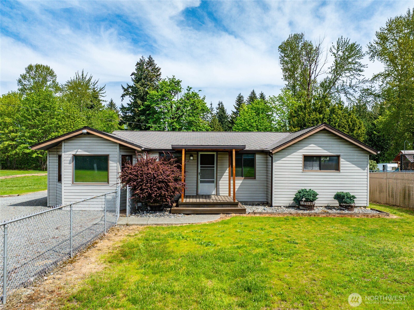 17830 116th Avenue Southeast Renton, WA 98058 - Photo 4 of 10 a view of a house with backyard and garden