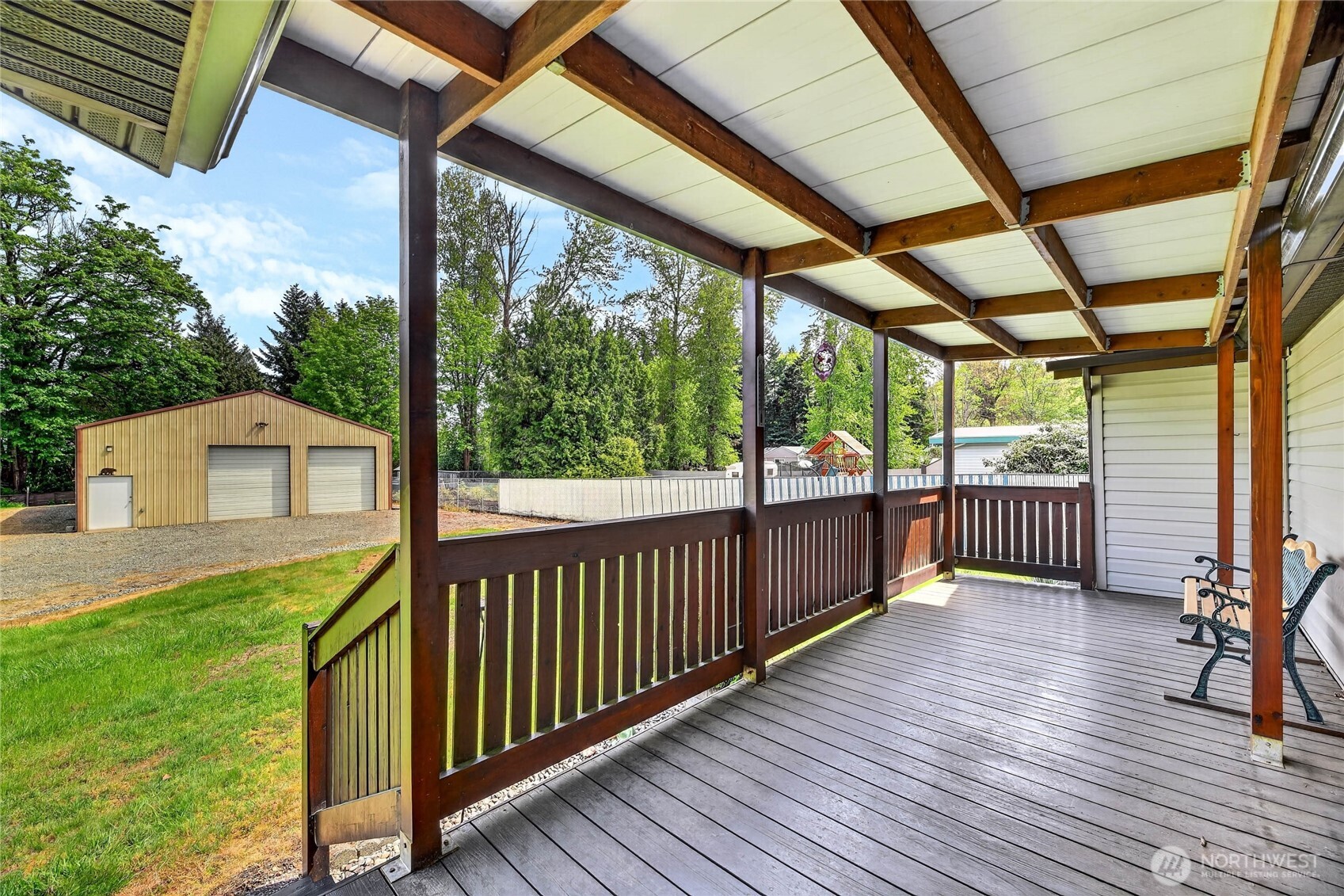 17830 116th Avenue Southeast Renton, WA 98058 - Photo 6 of 10 a view of a porch with wooden floor in front of house