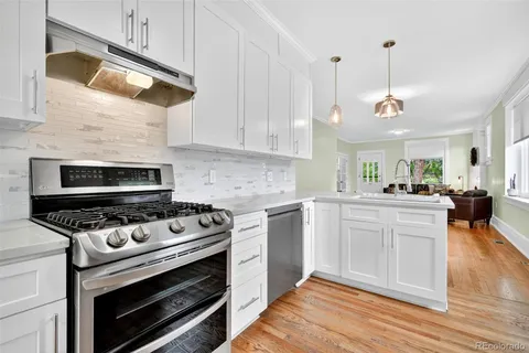 a kitchen with a stove and a microwave