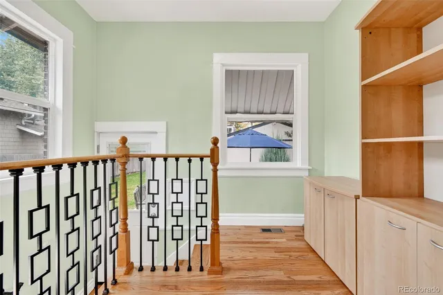 a view of entryway with wooden floor