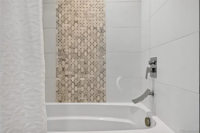 a bathroom with a bathtub