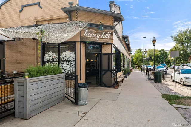a view of a chairs and table in the patio