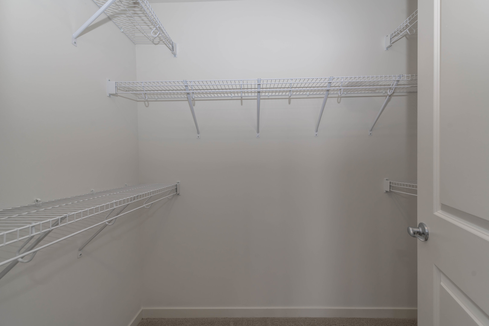 21599 West Field Court, Unit 21567 Deer Park, IL 60010 - Photo 7 of 14 a view of small space with racks on the wall