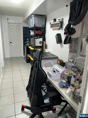 a room with furniture and gym equipment