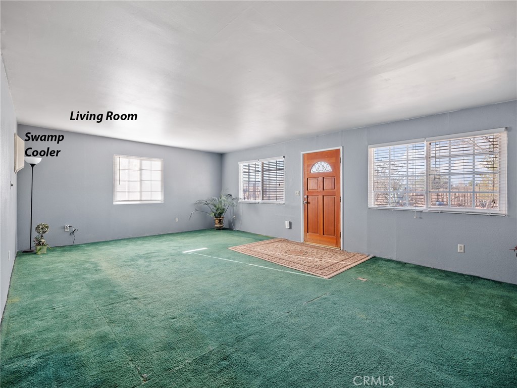 17757 Wheeler Road Helendale, CA 92342 - Photo 3 of 30 a view of an empty room with a window