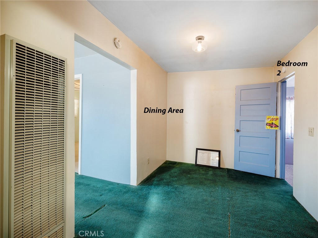 17757 Wheeler Road Helendale, CA 92342 - Photo 8 of 30 a view of an empty room with closet and a fireplace