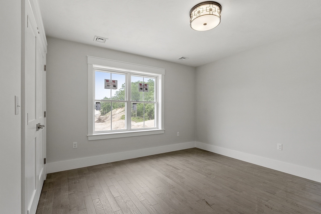 22 Waites Crossing Norfolk, MA 02056 - Photo 20 of 33 an empty room with a window