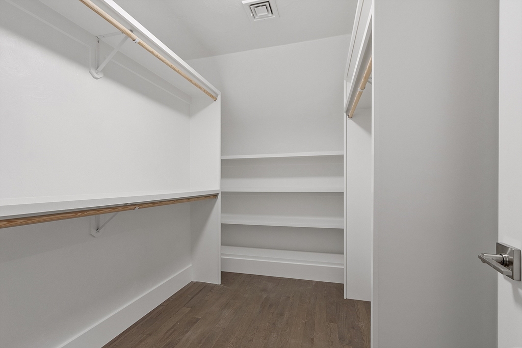 22 Waites Crossing Norfolk, MA 02056 - Photo 24 of 33 a view of walk in closet with empty racks