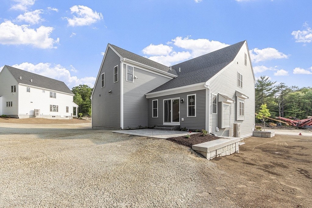 22 Waites Crossing Norfolk, MA 02056 - Photo 3 of 33 a view of a house with a patio