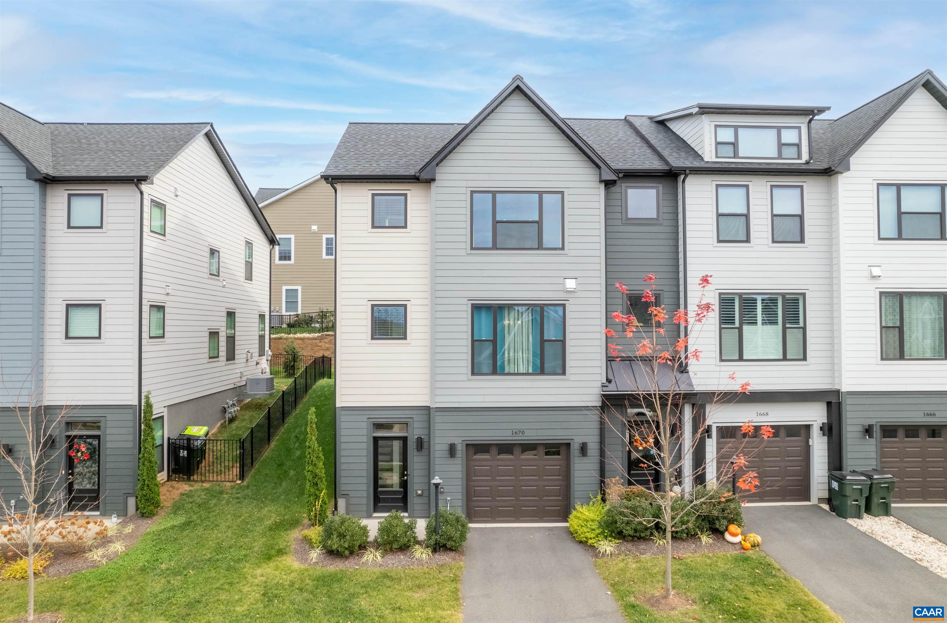 1670 Delphi Drive Charlottesville, VA 22911 - Photo 1 of 47 a front view of a house with garden