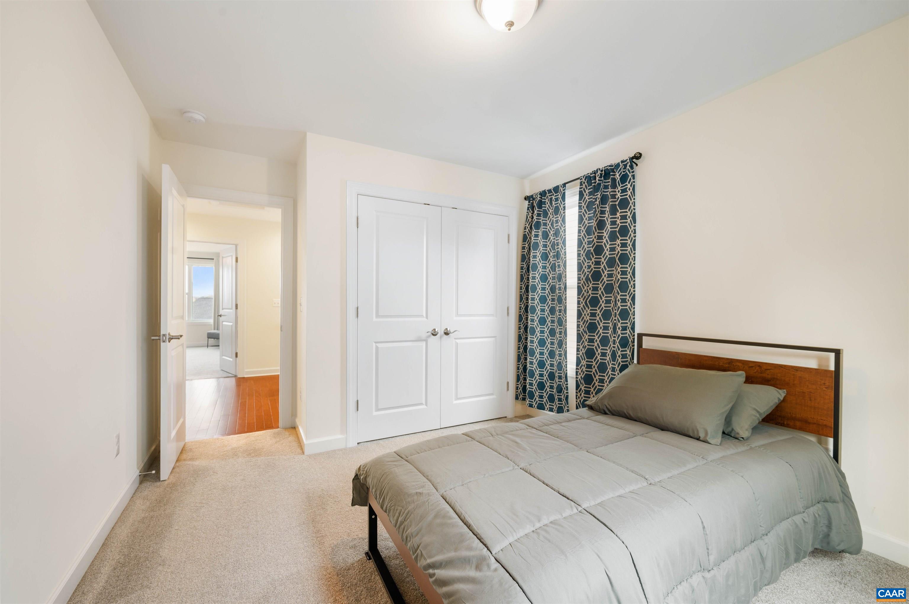 1670 Delphi Drive Charlottesville, VA 22911 - Photo 26 of 47 a bedroom with a bed and a window