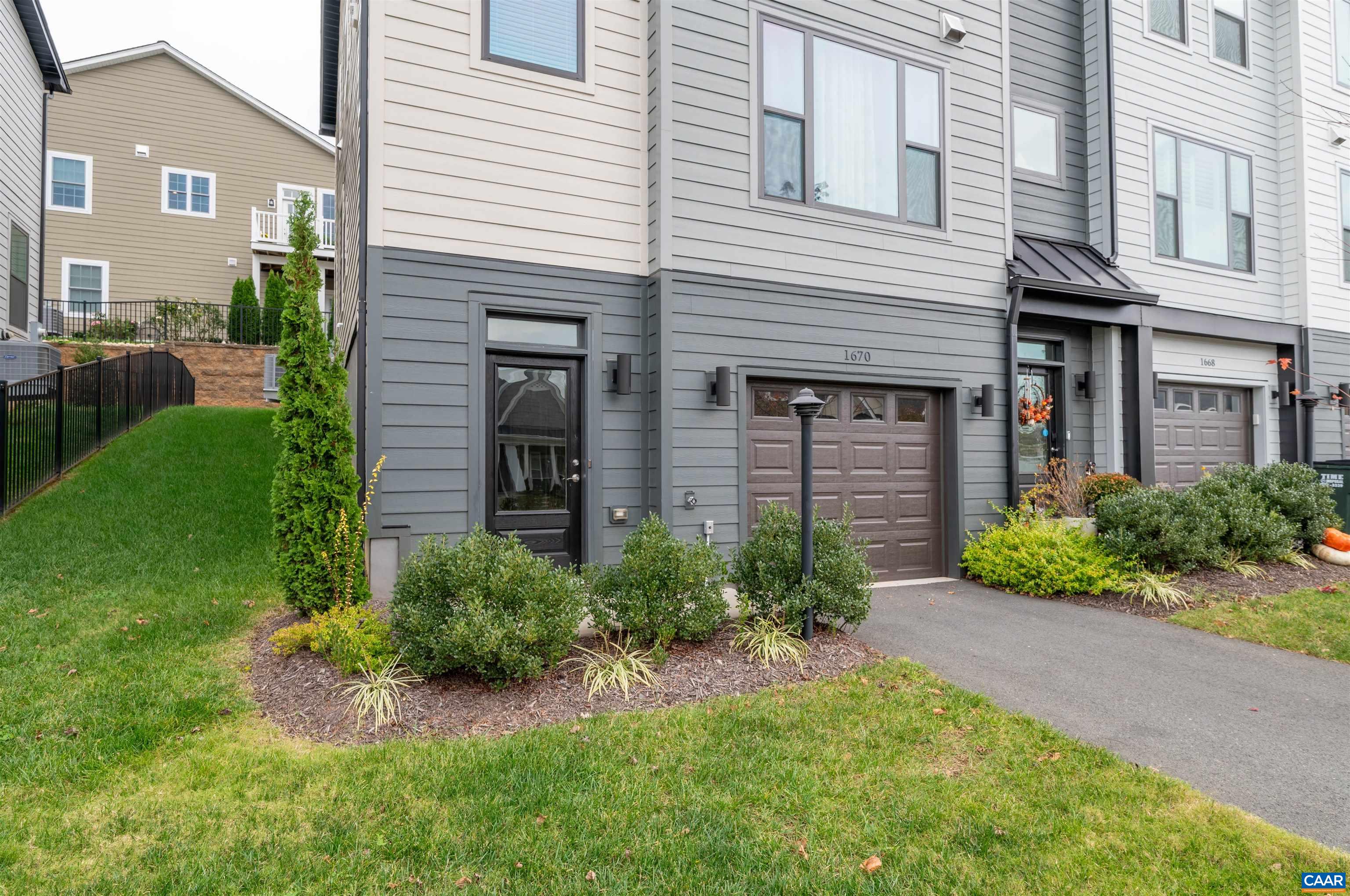 1670 Delphi Drive Charlottesville, VA 22911 - Photo 39 of 47 a front view of a house with garden and porch
