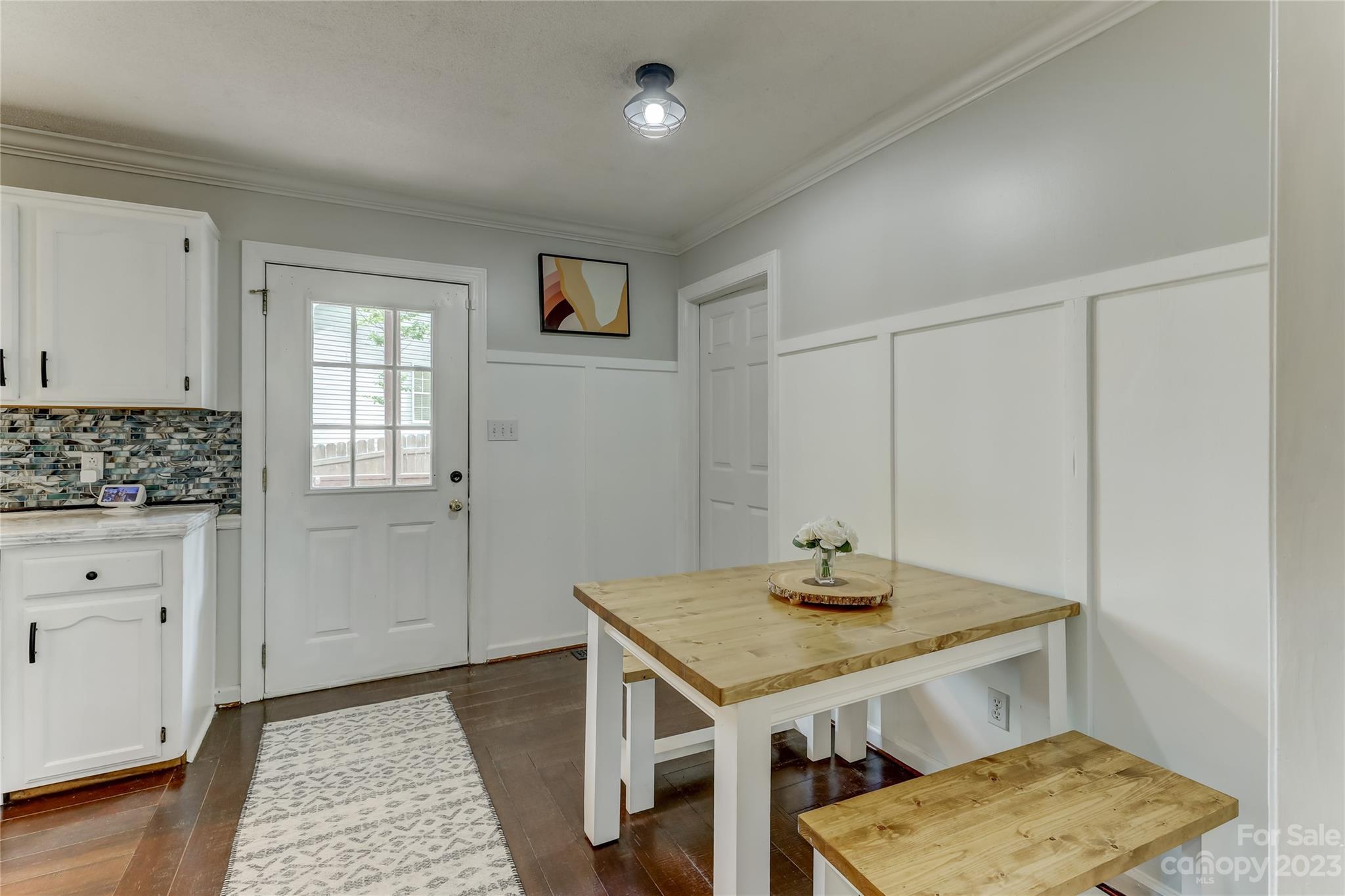 1631 Amanda Lane Rock Hill, SC 29730 - Photo 17 of 43 a view of kitchen with granite countertop window and wooden floor