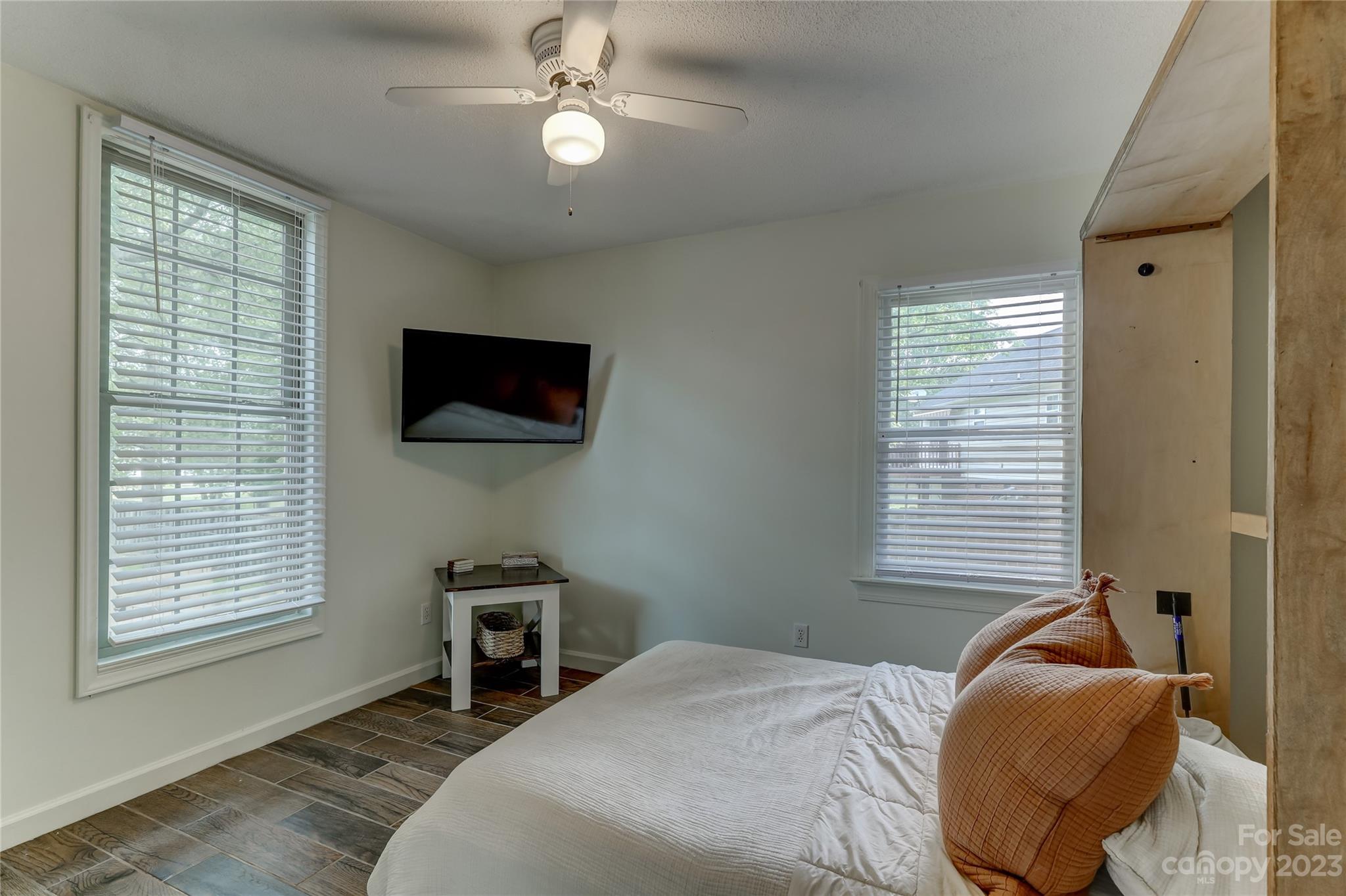 1631 Amanda Lane Rock Hill, SC 29730 - Photo 29 of 43 a bedroom with a bed and a flat screen tv