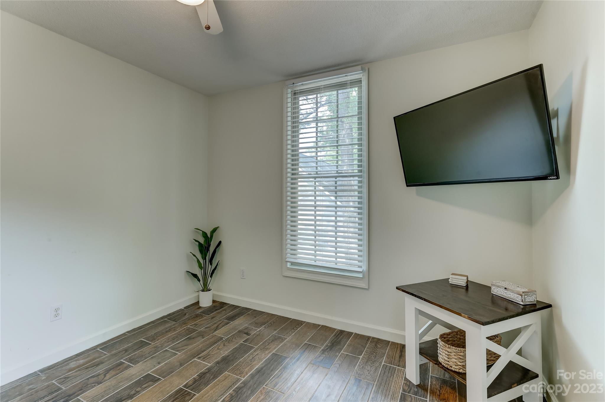 1631 Amanda Lane Rock Hill, SC 29730 - Photo 32 of 43 a view of a livingroom with wooden floor and a window