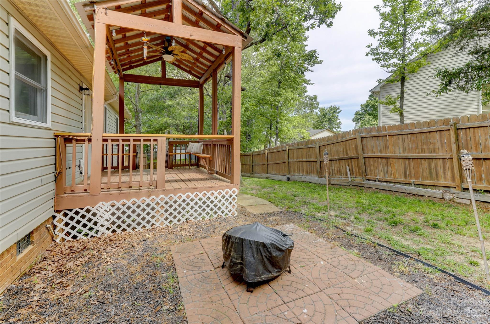 1631 Amanda Lane Rock Hill, SC 29730 - Photo 41 of 43 a view of a chair and table in the back yard