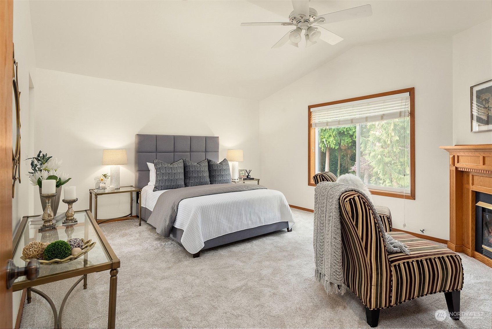 10818 27th Avenue Southeast Everett, WA 98208 - Photo 19 of 36 a bedroom with a bed and a chandelier