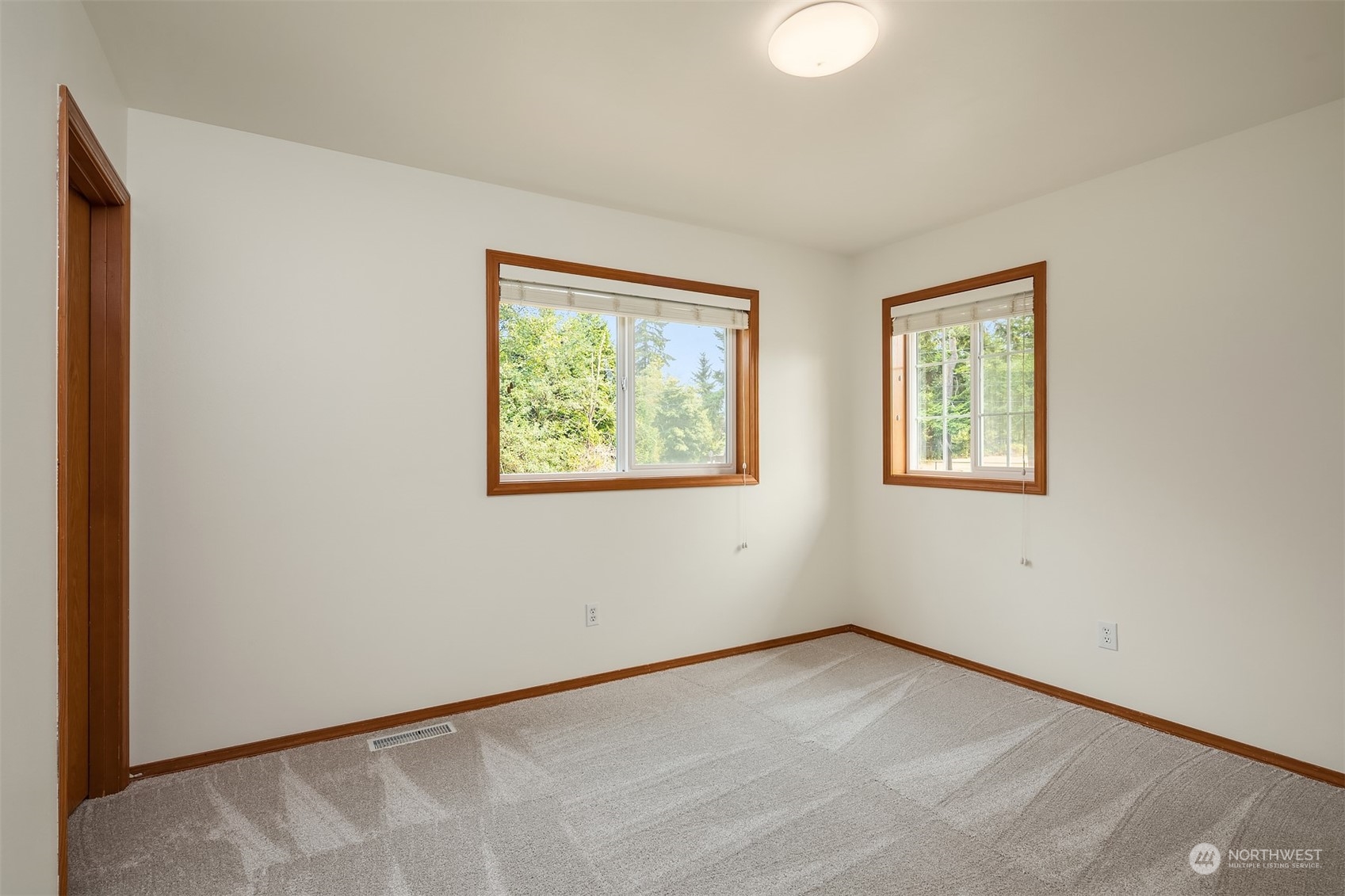10818 27th Avenue Southeast Everett, WA 98208 - Photo 27 of 36 a view of an empty room with windows