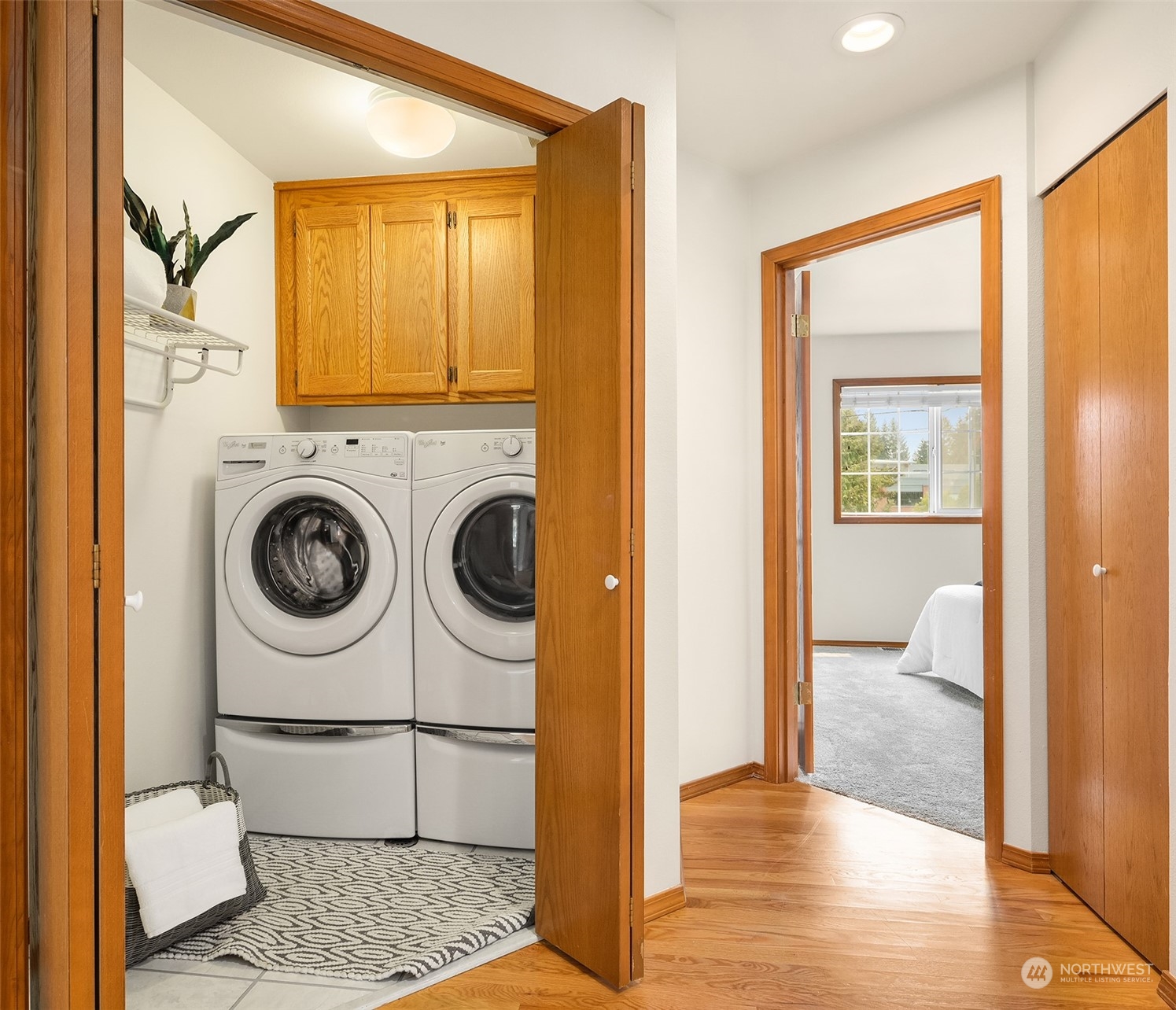 10818 27th Avenue Southeast Everett, WA 98208 - Photo 29 of 36 a view of a hallway with a washer and dryer