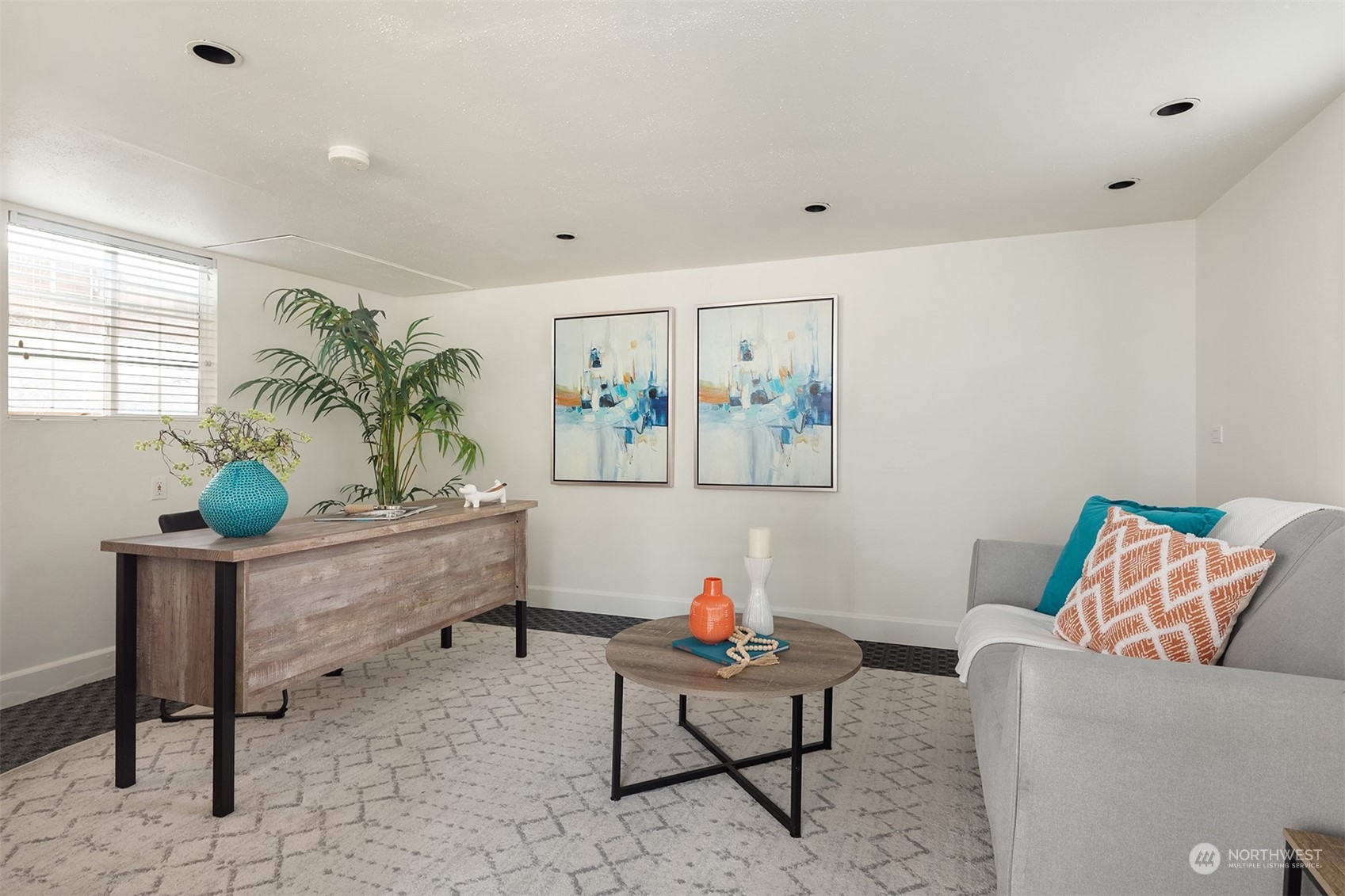 10818 27th Avenue Southeast Everett, WA 98208 - Photo 30 of 36 a living room with furniture and a rug