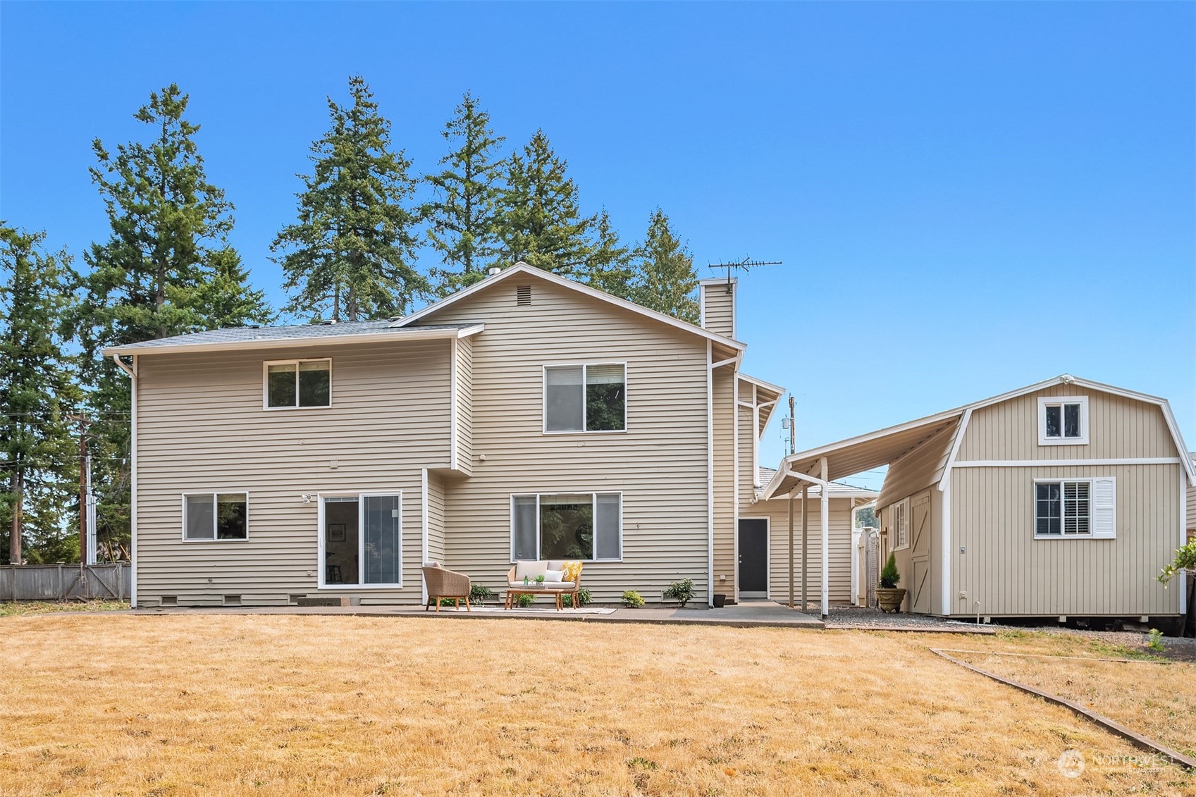 10818 27th Avenue Southeast Everett, WA 98208 - Photo 34 of 36 a front view of a house with a yard