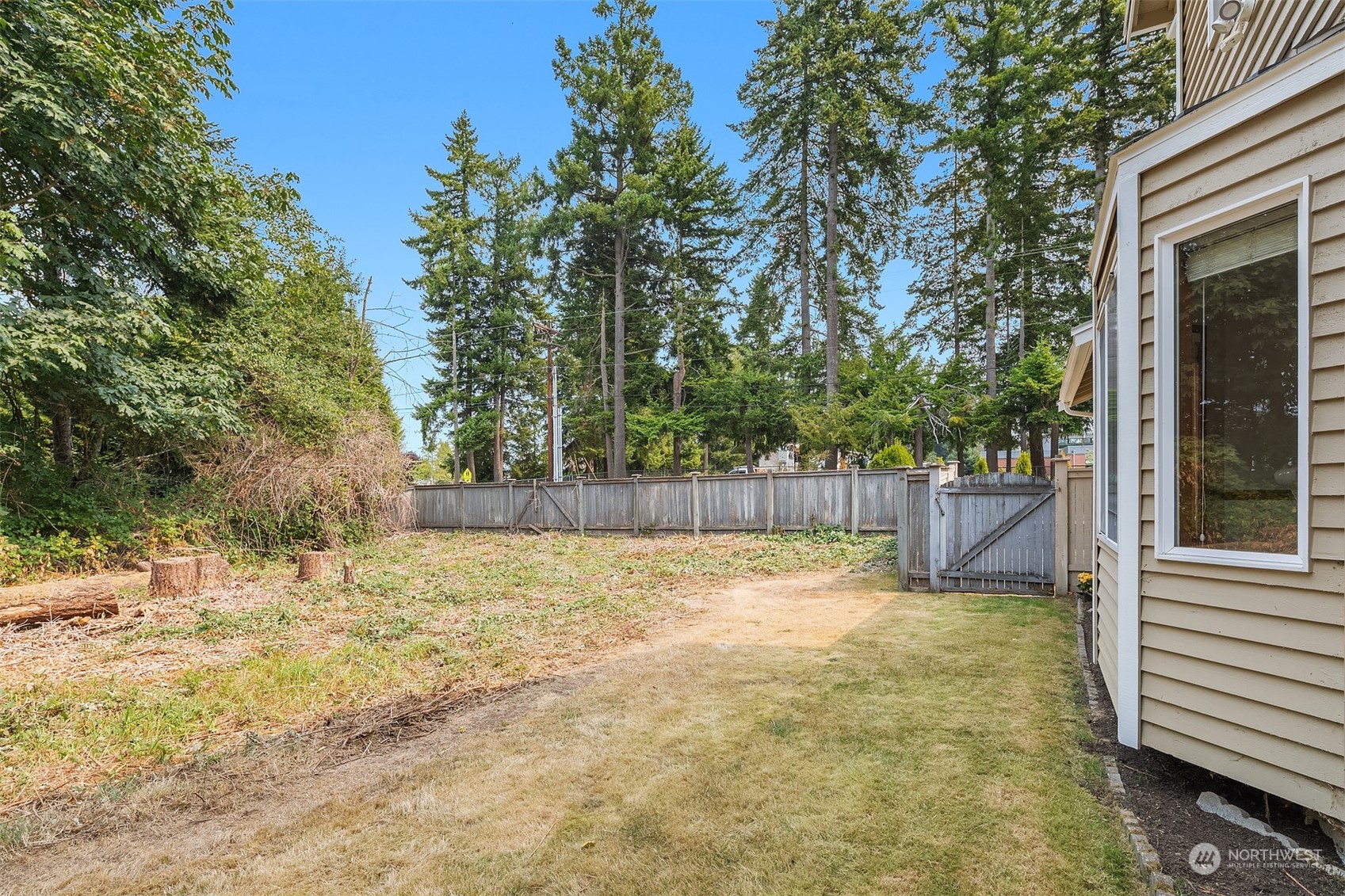 10818 27th Avenue Southeast Everett, WA 98208 - Photo 36 of 36 a view of a yard with a fence