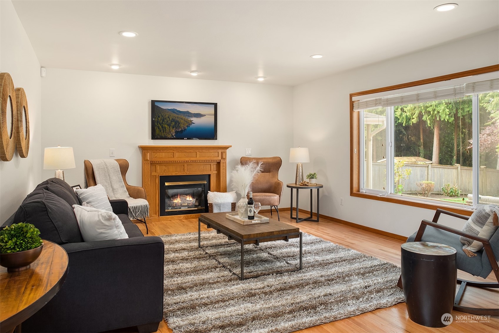 10818 27th Avenue Southeast Everett, WA 98208 - Photo 5 of 36 a living room with furniture and a fireplace
